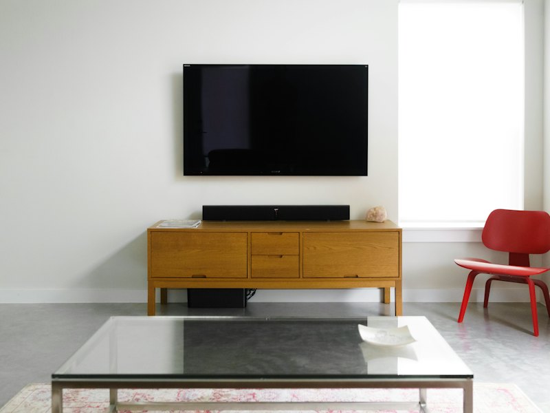 Flat-screen TV mounted on a living room wall