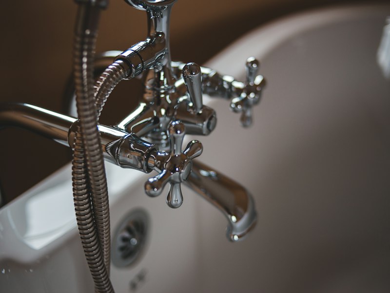 Chrome faucet on a white sink